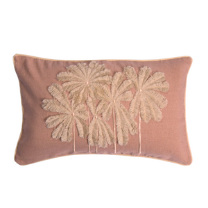A rectangular dusty rose throw pillow featuring a raised, textured beige palm tree embroidery design on the front
