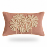 A rectangular dusty rose throw pillow featuring a raised, textured beige palm tree motif on the front, set against a clean white background with a soft drop shadow.